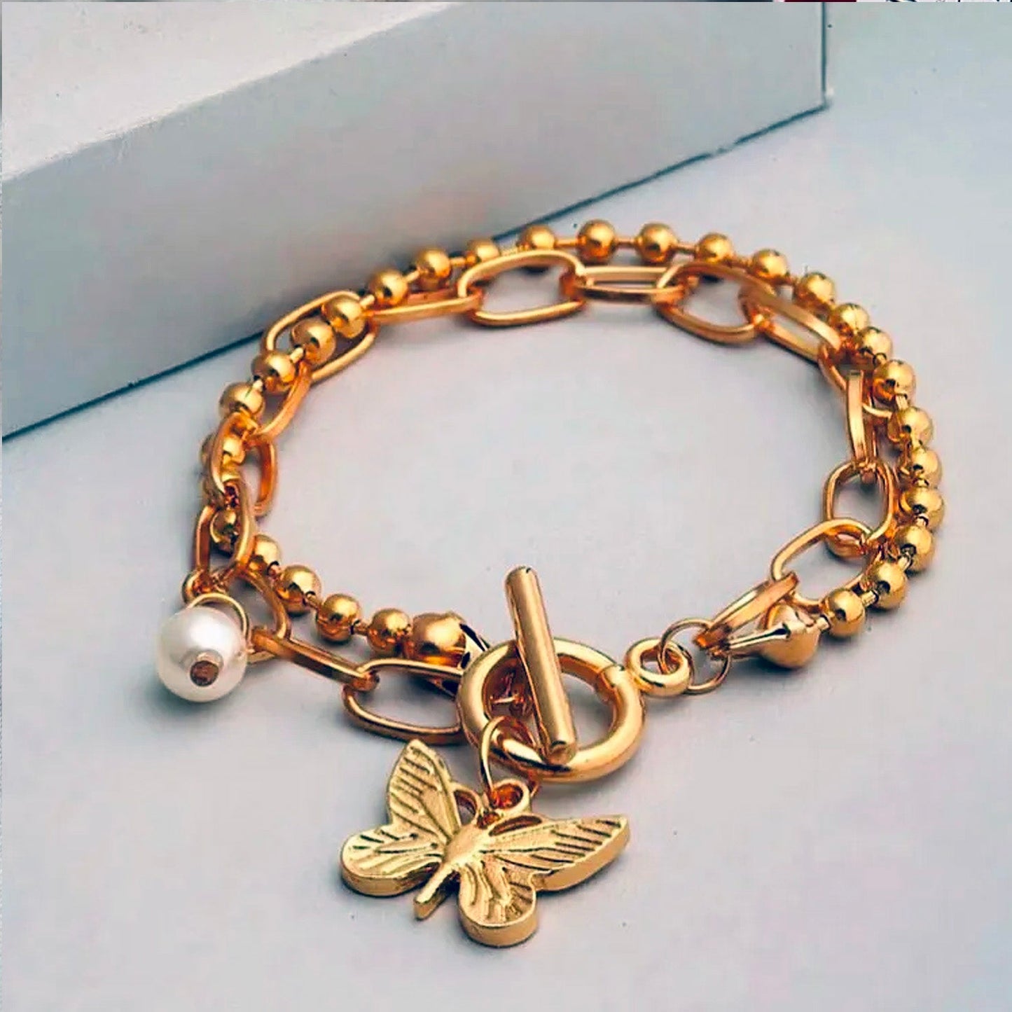 BUTTERFLY PENDANT LAYERED BRACELET